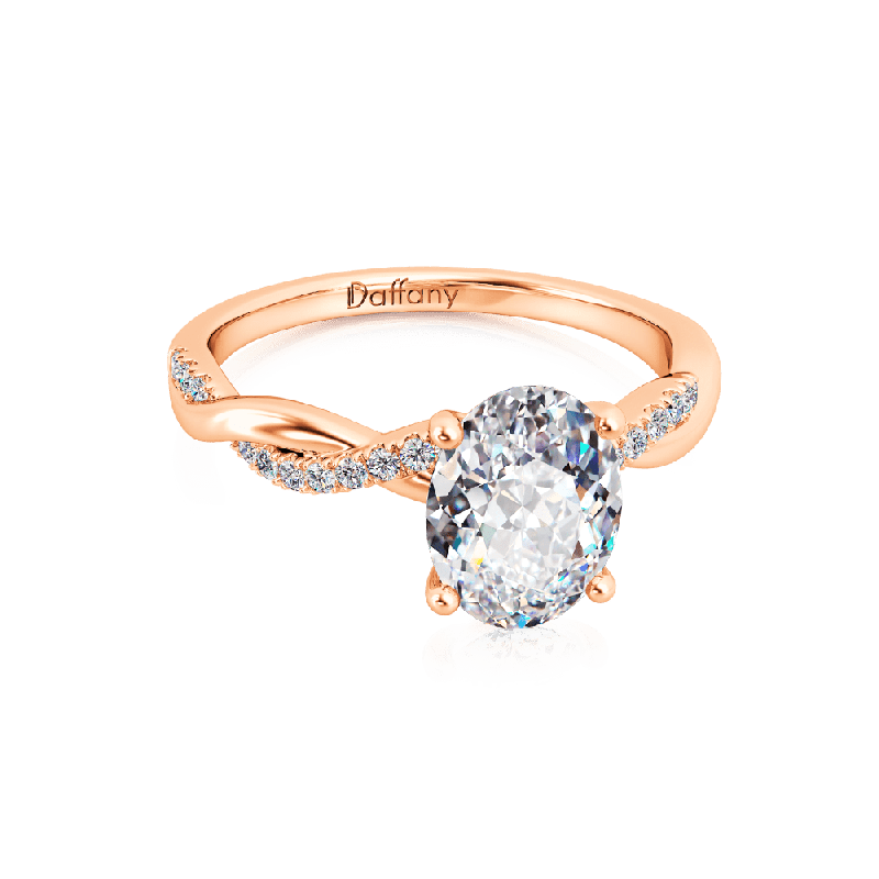 Solitaire Oval Cut Twisted Infinity Ring