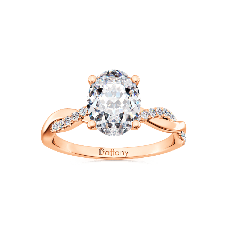 Solitaire Oval Cut Twisted Infinity Ring