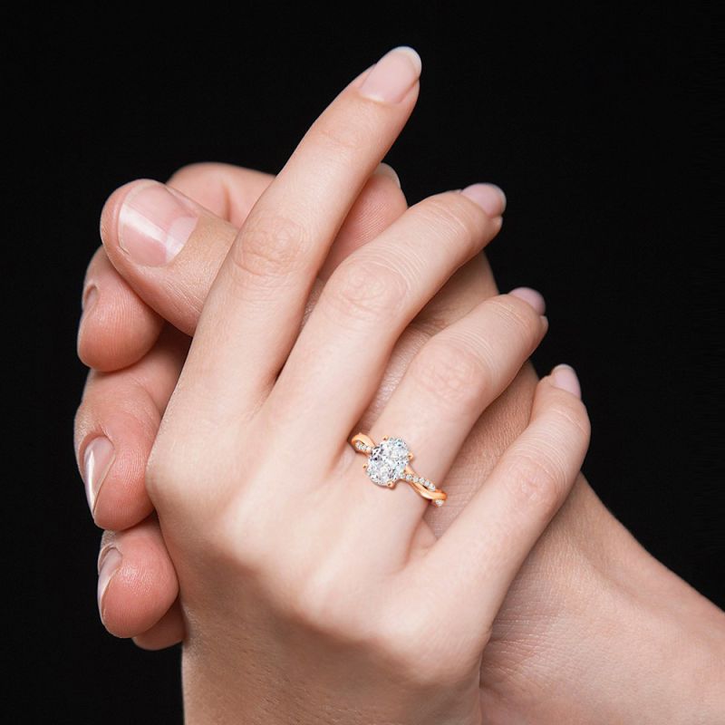 Solitaire Oval Cut Twisted Infinity Ring