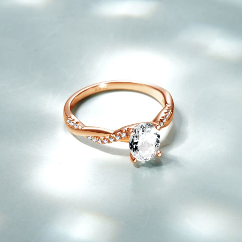 Solitaire Oval Cut Twisted Infinity Ring