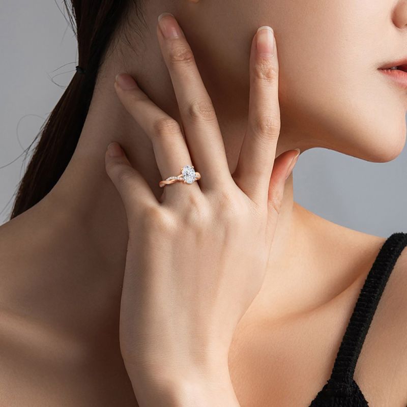 Solitaire Oval Cut Twisted Infinity Ring